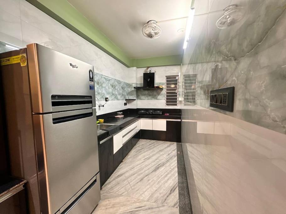 Modern Luxe Haven Apartment สิริกุรี ภายนอก รูปภาพ